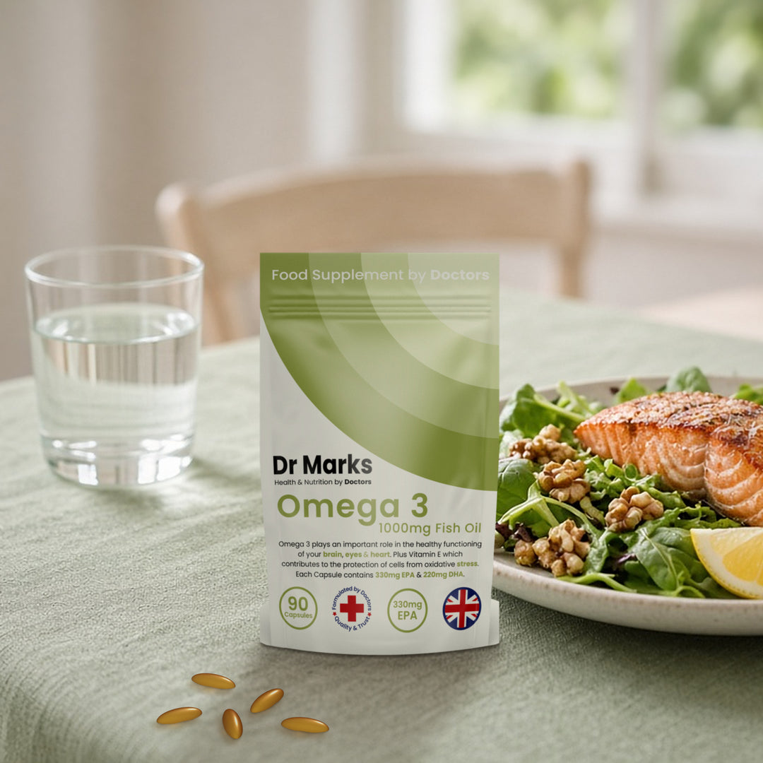 Dr Marks Omega 3 fish oil pouch on a table beside a salmon salad